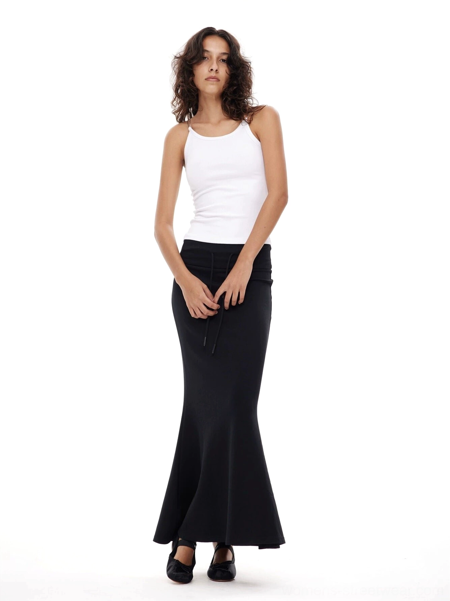 Black fitted mermaid floor-length skirt shown from the front with an adjustable drawstring waist and sleek fishtail hem