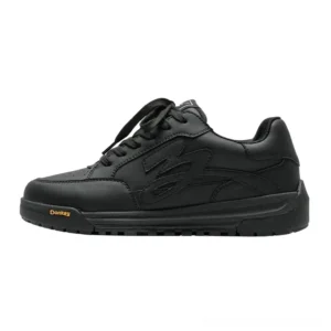 Black low-top platform skate sneakers with smooth black upper, flame embossed side detail, thick textured rubber outsole, and casual streetwear design