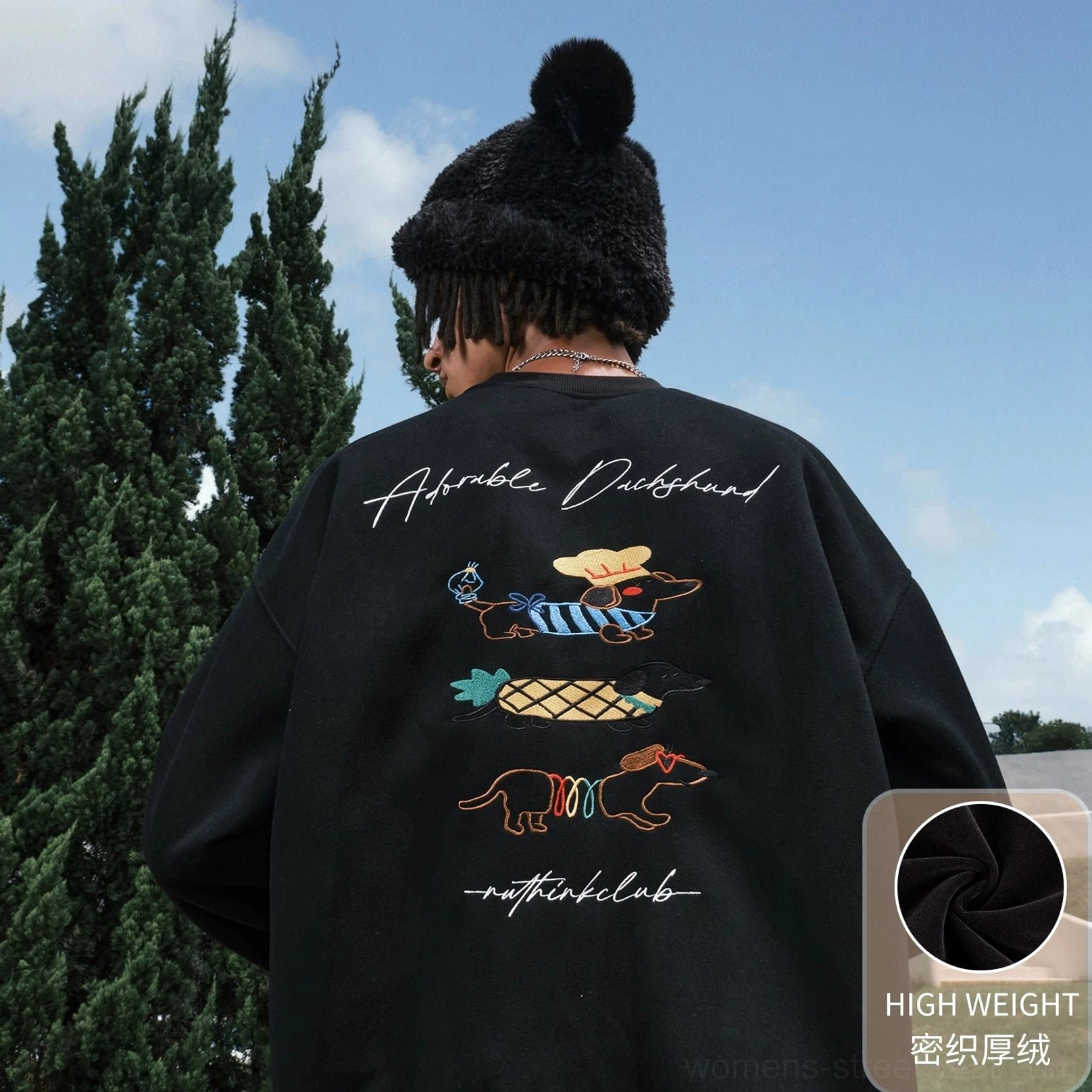 Black fleece-lined oversized dachshund graphic sweatshirt for warm casual streetwear outfits and relaxed seasonal layering