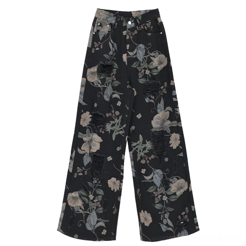 Black floral distressed wide-leg jeans with high-waisted fit and bold modern streetwear character