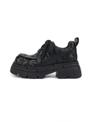 Black floral sequin platform derby shoe in side three-quarter view with 3D flower toe cap, rope laces, rounded square toe, rear pull tab, and chunky EVA platform sole