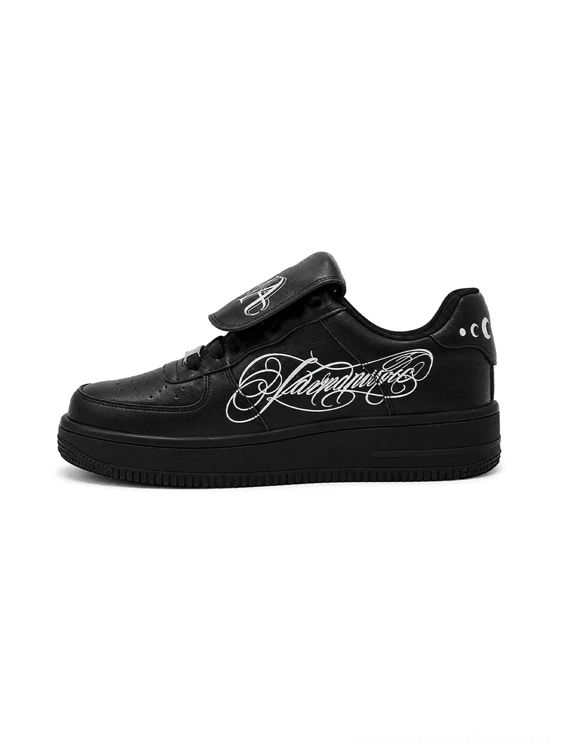 Black foldover tongue chunky leather sneakers with small gothic tongue print, cursive lateral artwork, lace up front and solid leather upper