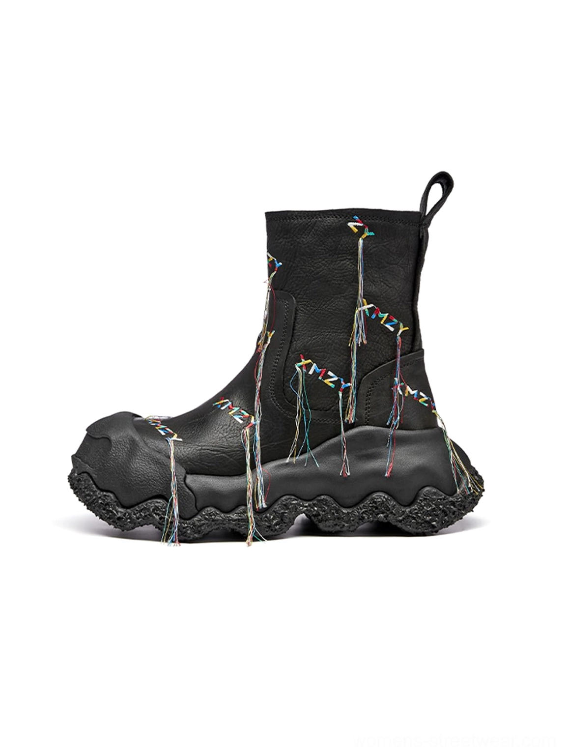 Black fringe western ankle boots side view with colorful geometric planet-inspired tassels, rear pull tab, and chunky treaded sole on white background