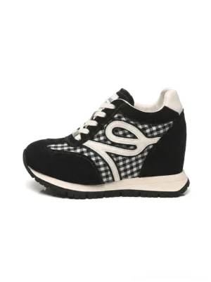 Left side profile of black gingham hidden-wedge platform sneakers for women with suede-look panels white laces and curved graphic overlay