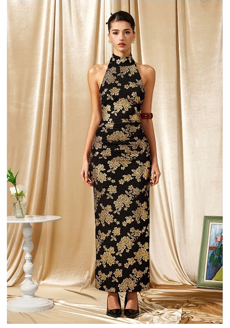 Black and gold floral bodycon cheongsam maxi dress styled with black high heels and a brown arm cuff