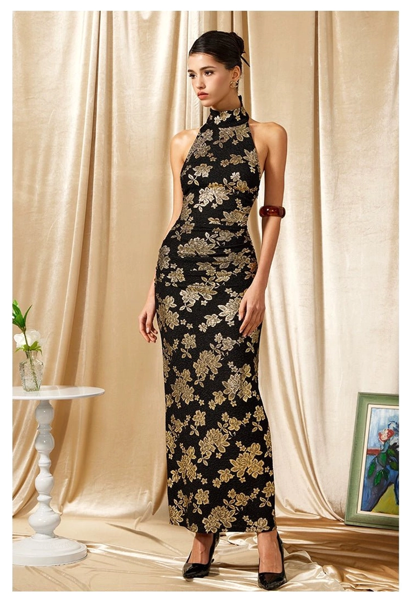 Right side view of a black and gold floral pencil silhouette cheongsam dress with fitted waist and floor length hem
