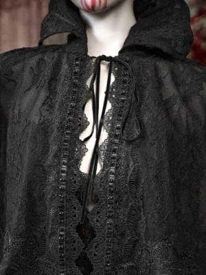 Close-up of black gothic lace cape with high collar front tie and intricate embroidered floral lace trim