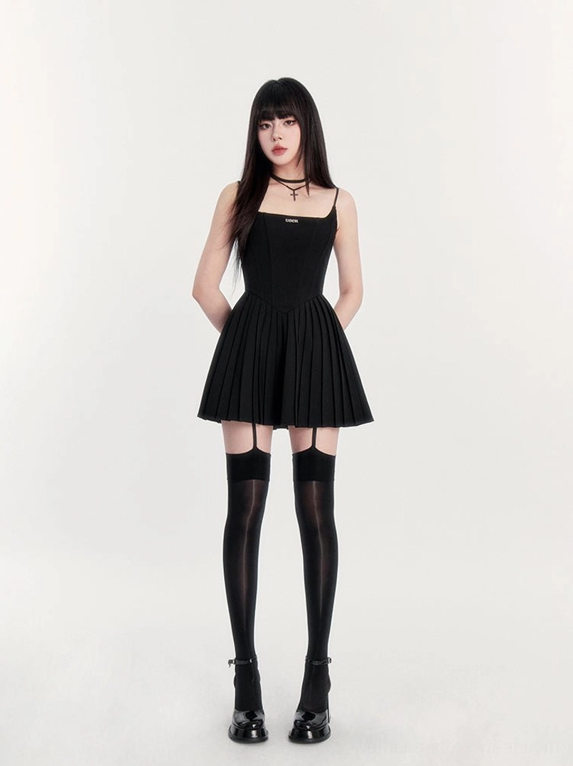 Black gothic pleated cami mini dress with corset bodice flared skirt thigh-high stockings and leather shoes