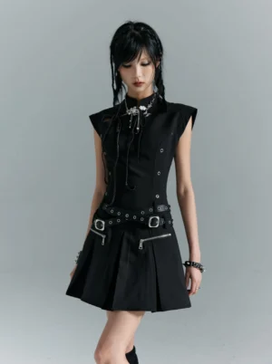 Black gothic punk pleated mini dress with stand collar zipper pockets and studded waist belt front full body view