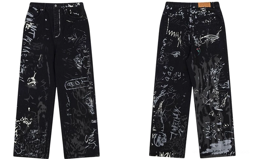 Women's black graffiti print wide-leg streetwear jeans featuring paint splatter and sketch-inspired denim details