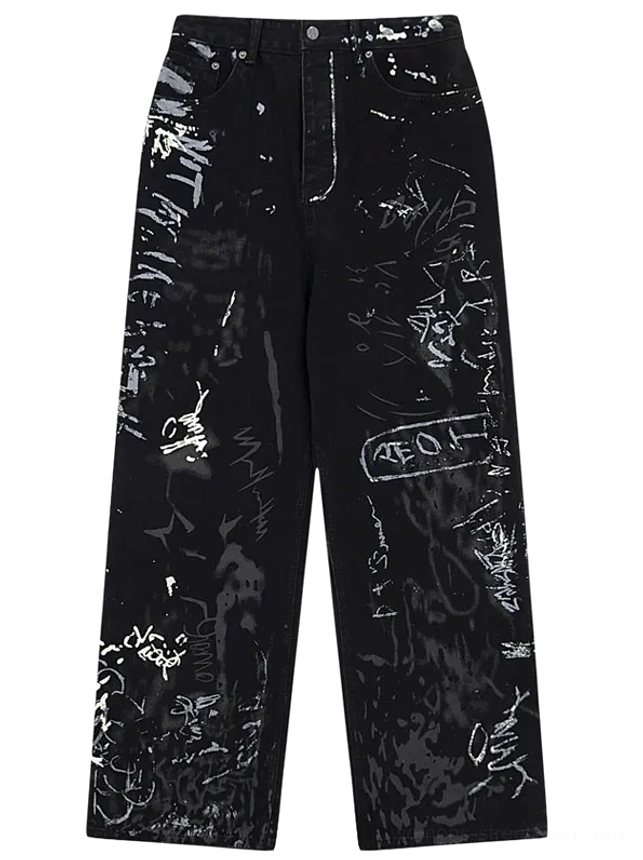 Front flat lay of black graffiti print wide-leg jeans for women with white handwritten street art and paint splatter details