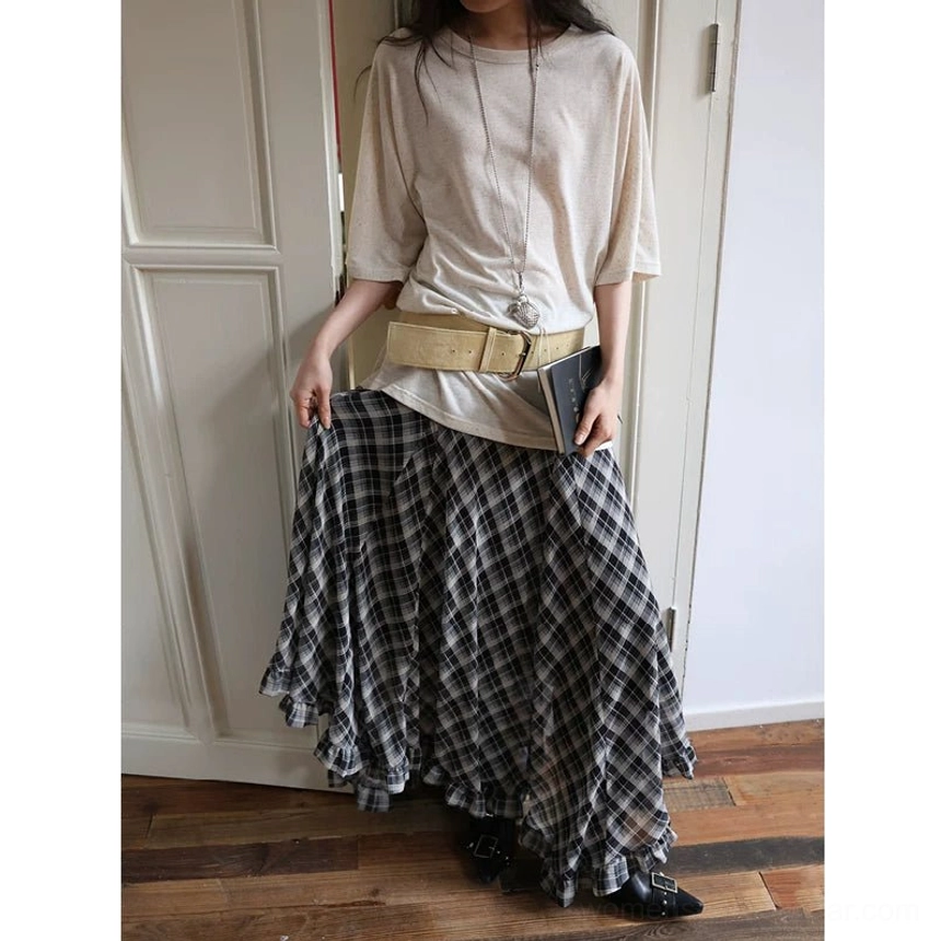 Black white and gray plaid chiffon skirt with an asymmetric layered hem in a contemporary streetwear outfit