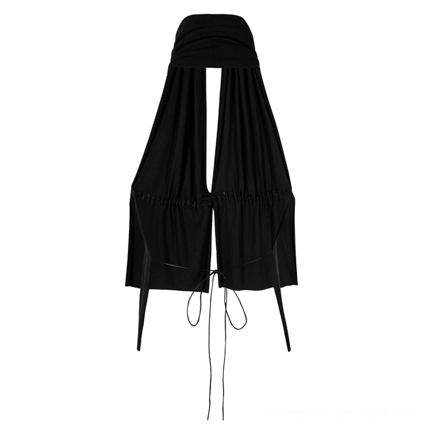 Flat lay view of a black halter keyhole peplum top with plunging front cutout and adjustable tie straps