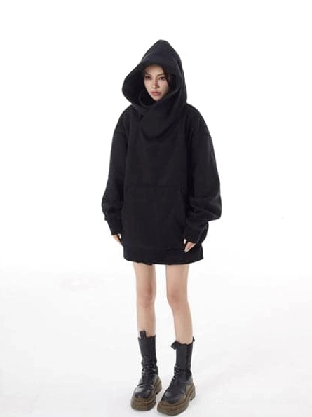 Black oversized high-neck hooded pullover styled with mini skirt and platform boots for an edgy Y2K streetwear outfit