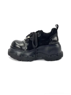 Black mixed-leather horsehide platform derby shoes with oversized rope laces, rounded toe, and chunky lug sole on a white background