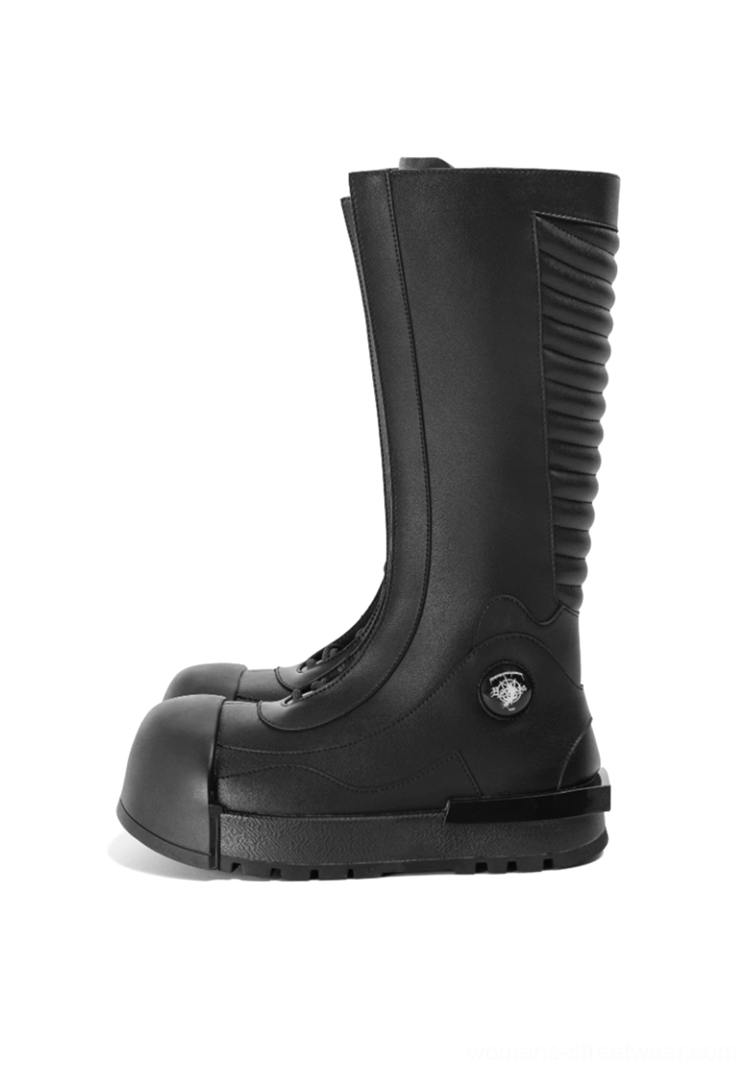 Black knee-high platform combat boot in front three-quarter view with front laces, circular side hardware, rounded toe, and chunky flat outsole