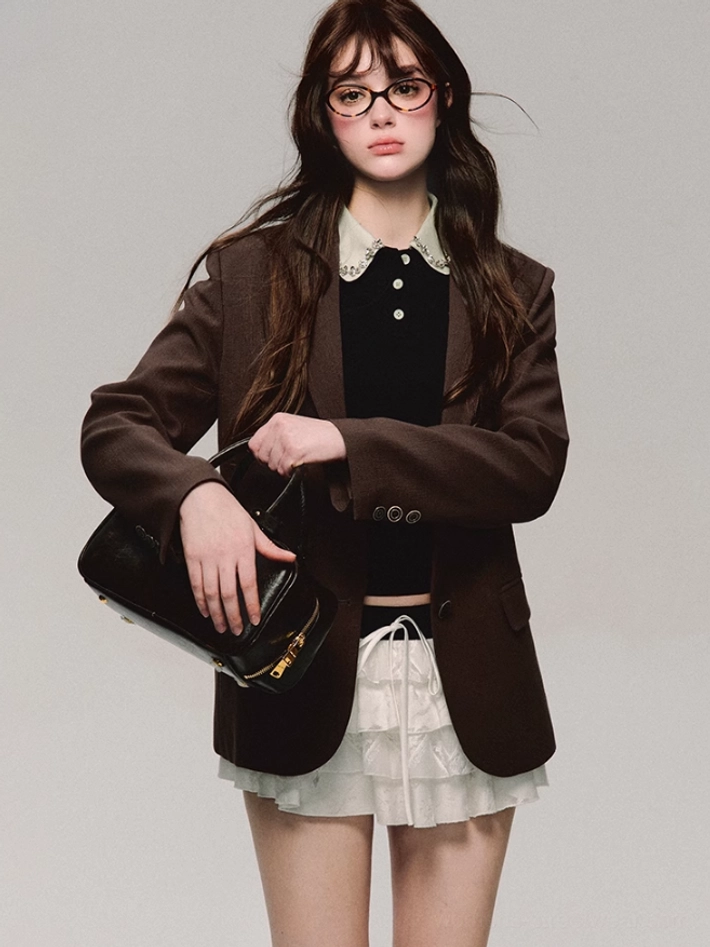 Black lace collar cropped polo top layered under a brown blazer with a ruffle mini skirt for Korean preppy streetwear
