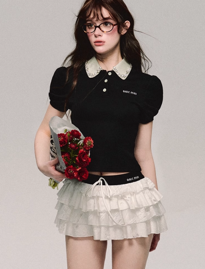 Black cropped polo top with lace collar for feminine Seoul-inspired streetwear outfits