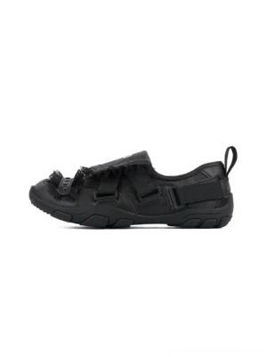 Black lace panel rivet sport sandal shown in side profile with decorative lace trim, adjustable hook-and-loop straps, open toe, and rugged rubber outsole