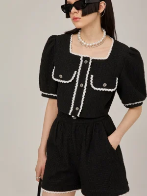 Black lace trim tweed blouse and high-waist shorts two-piece set worn by model in front view