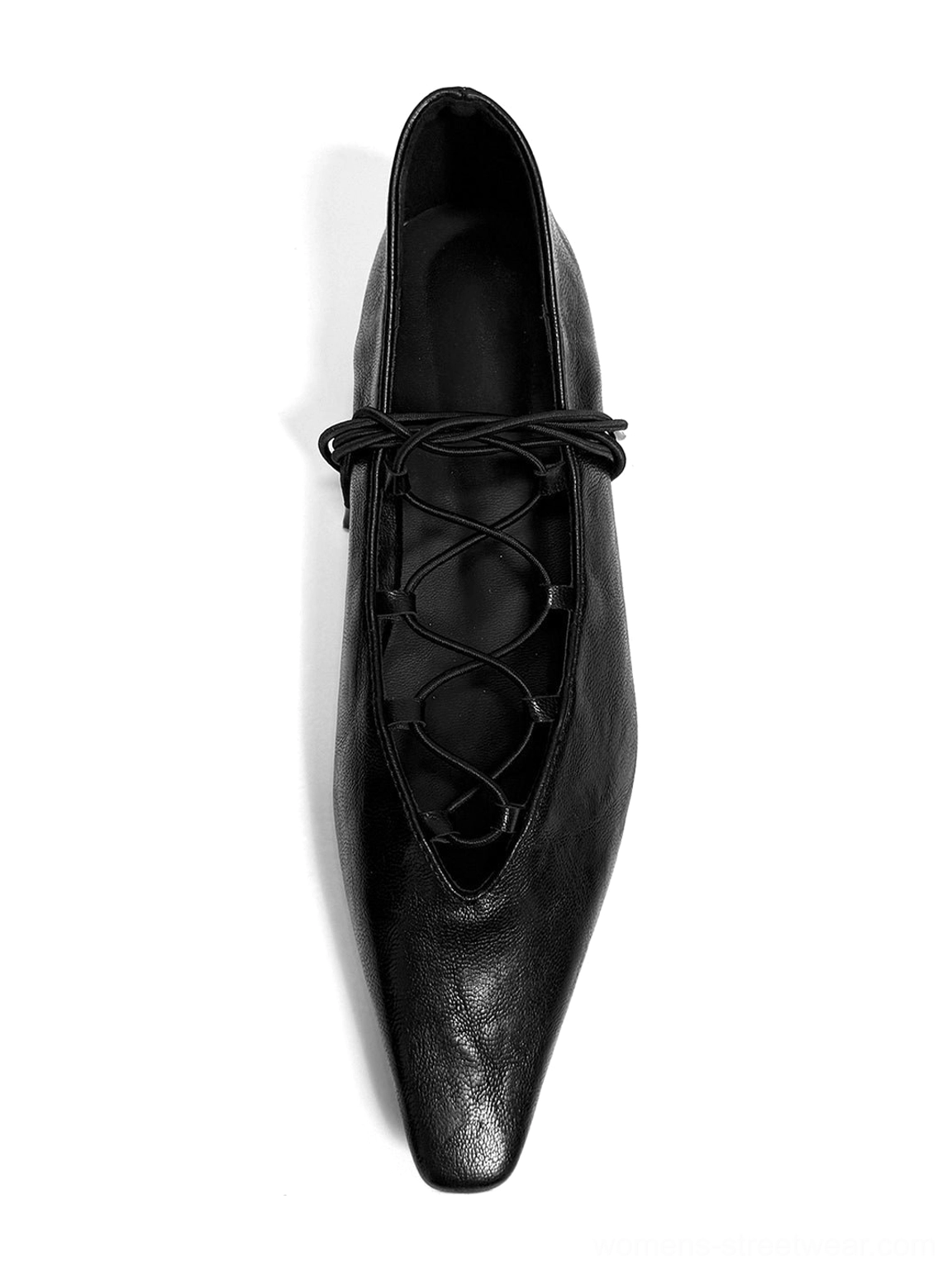 Top-down flat lay of black lace-up Mary Jane ballet flats on a white background with crossed front laces and pointed square toes