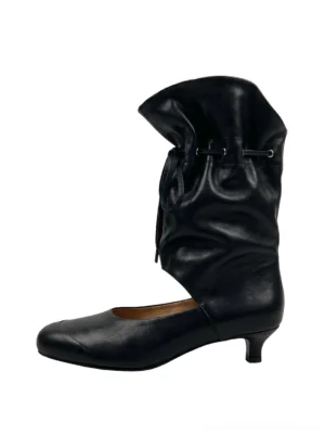 Front view of black lace-up slouch leather sandal boots with ruched shaft, open instep, tapered toe, and low kitten heel