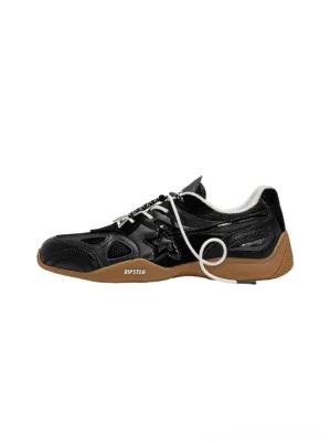 Side profile of black layered drawcord runner sneakers with mixed suede leather and mesh panels, white laces, padded collar, and gum brown rubber outsole
