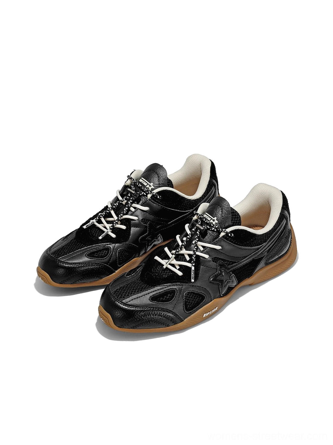 Top-down view of black layered runner sneakers with mixed material panels, contrasting laces, side star detail, and gum traction outsole