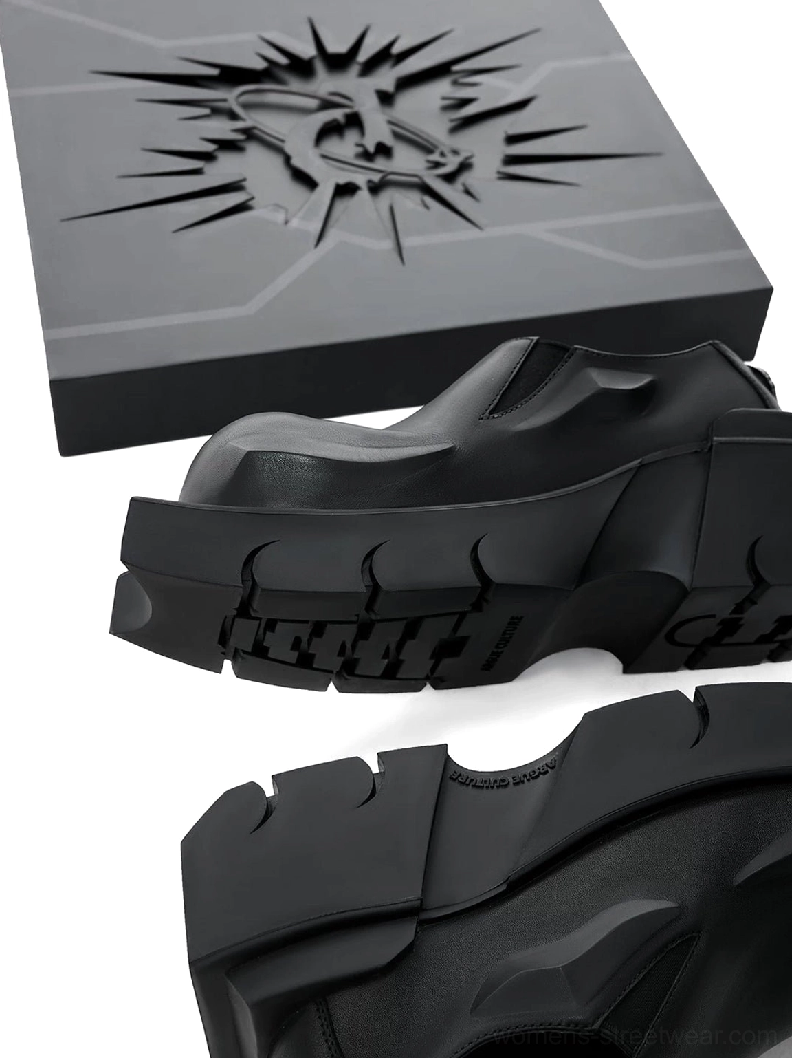 Black leather platform derby shoes with horn-inspired side detail and lug sole for modern gothic streetwear styling