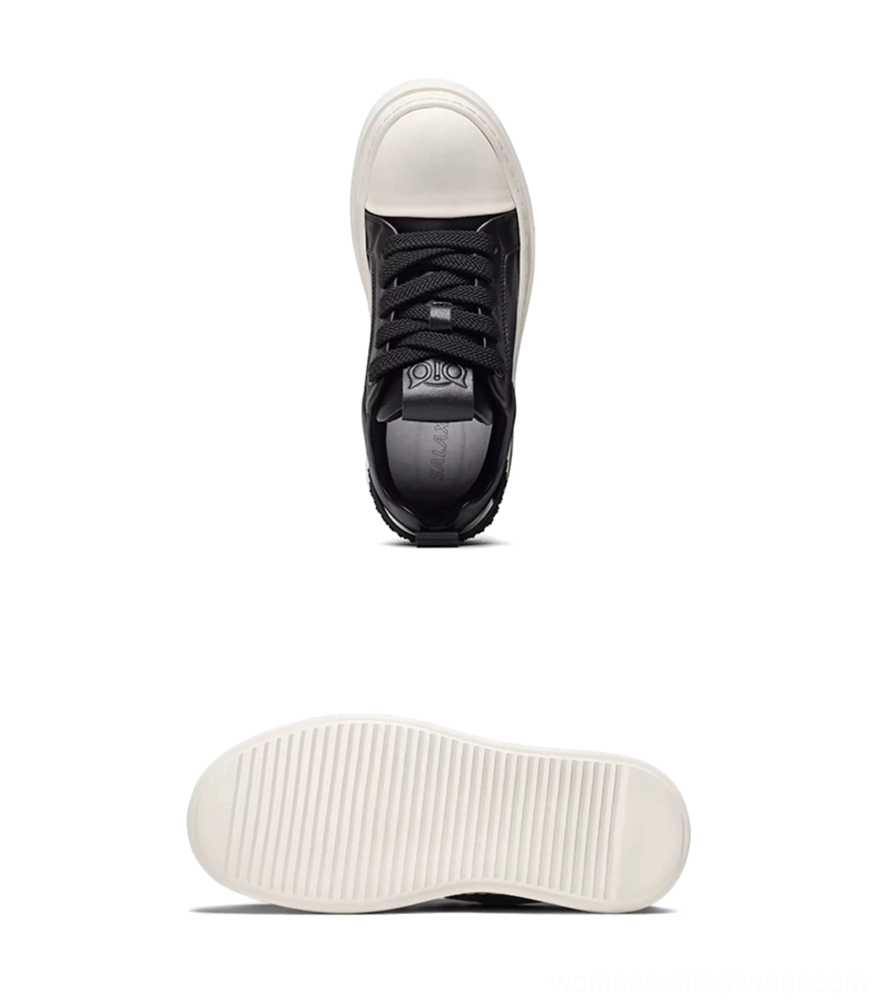 Top view of black leather platform sneakers showing lace-up closure white toe cap and cushioned insole