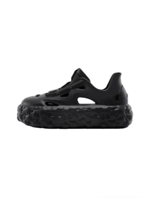 Black lightweight star platform sandals shown from the side with ventilated slip-on upper and chunky textured lug sole