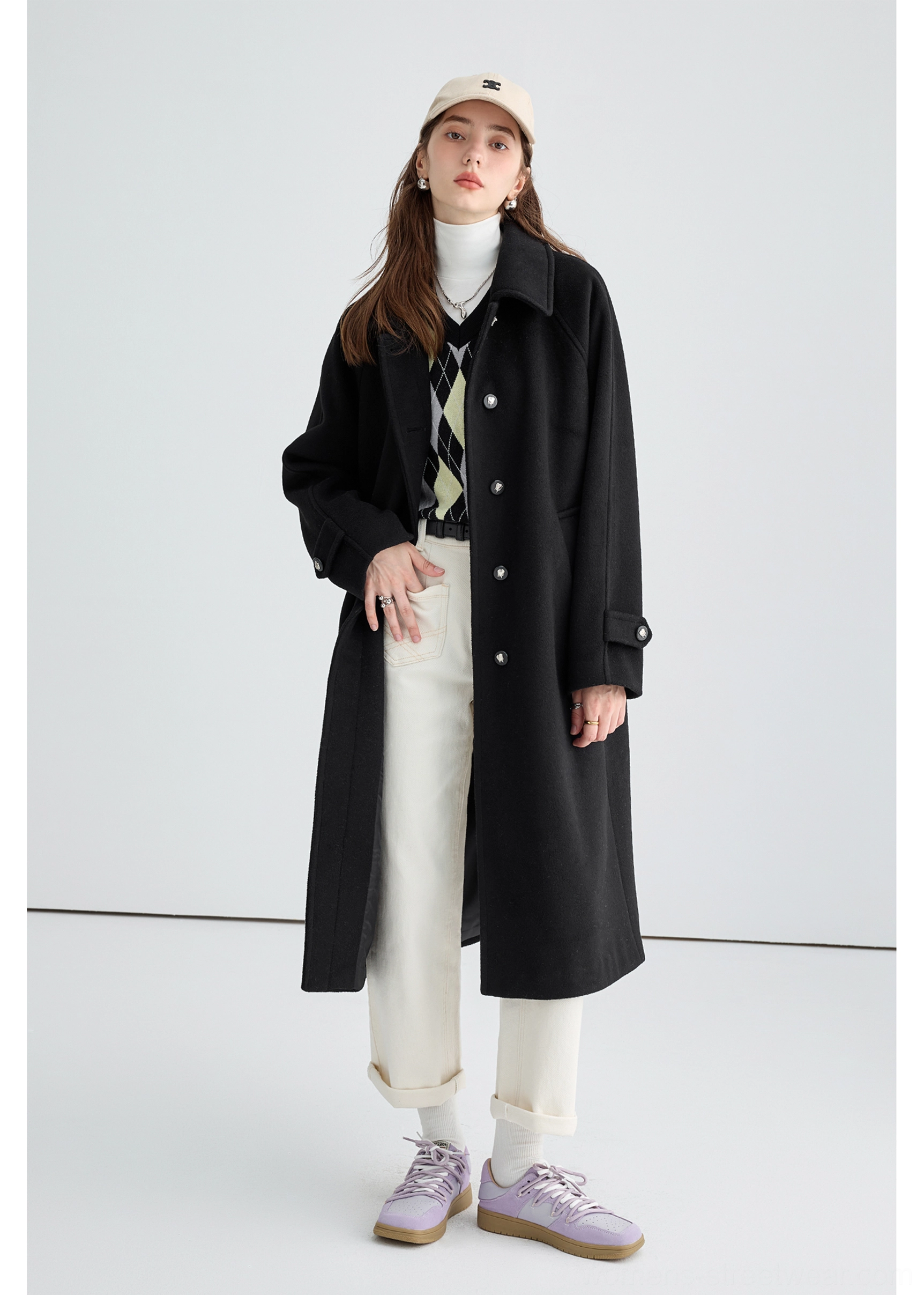 Black long insulated streetwear overcoat product image for minimalist urban winter outfits