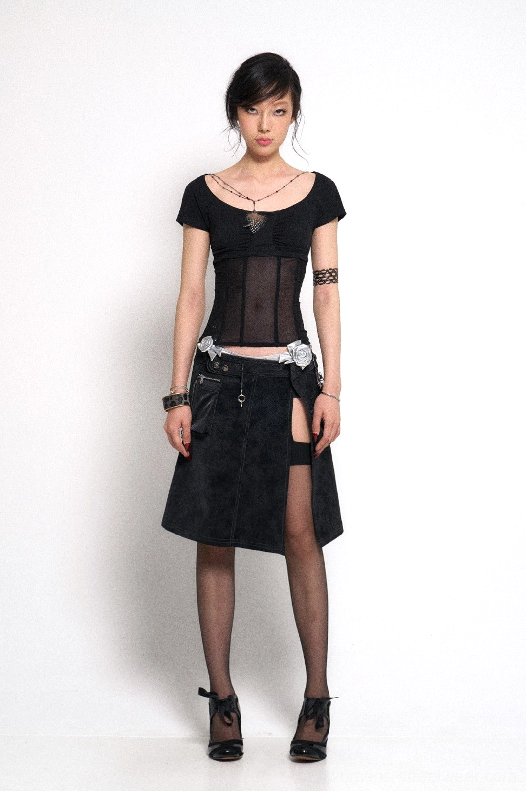 Black low rise gothic mini skirt with asymmetric side slit detachable waist chain and weathered finish