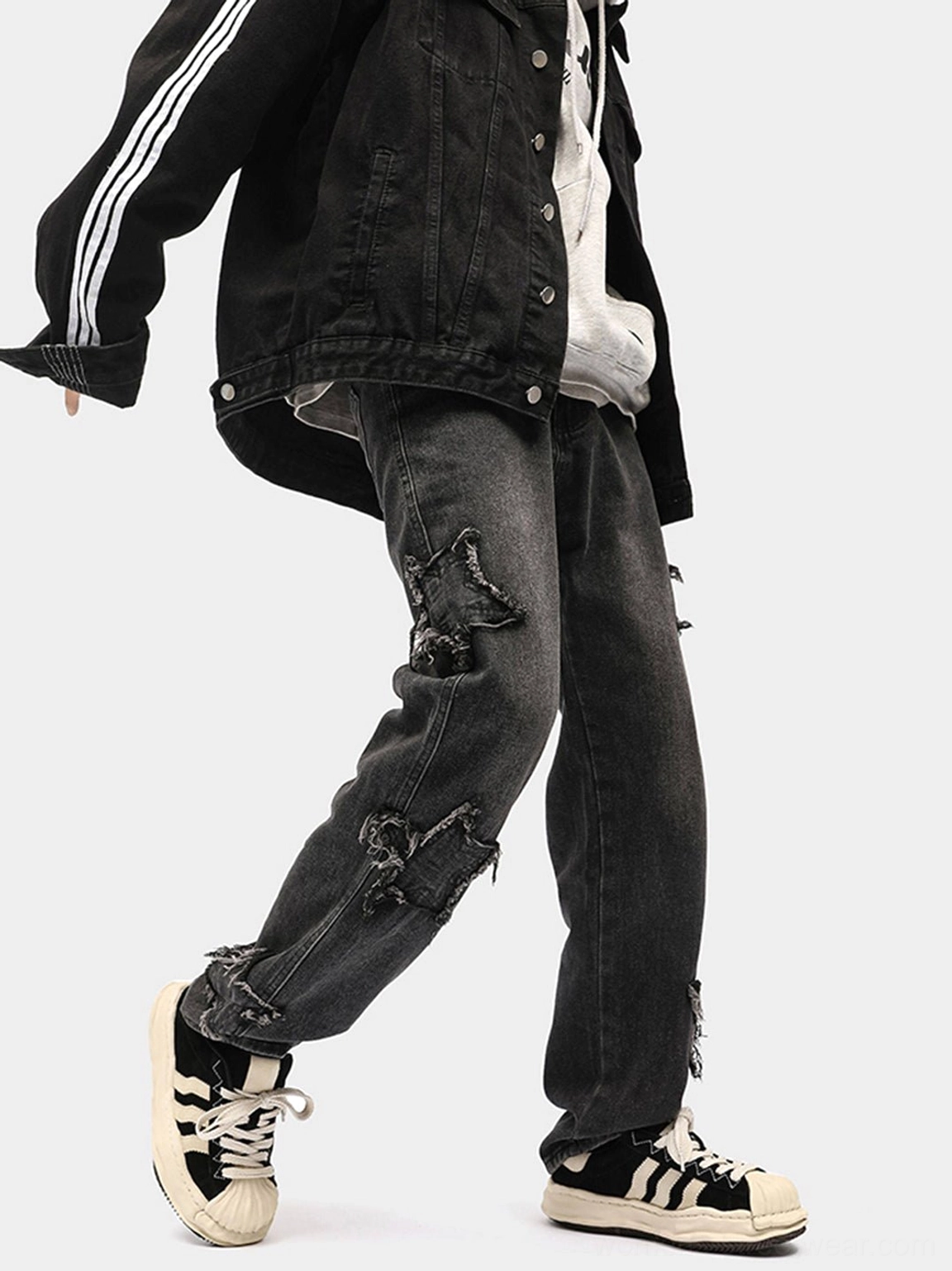 Full lower-body streetwear outfit featuring black melted shell-toe platform sneakers, frayed denim, and a striped denim jacket