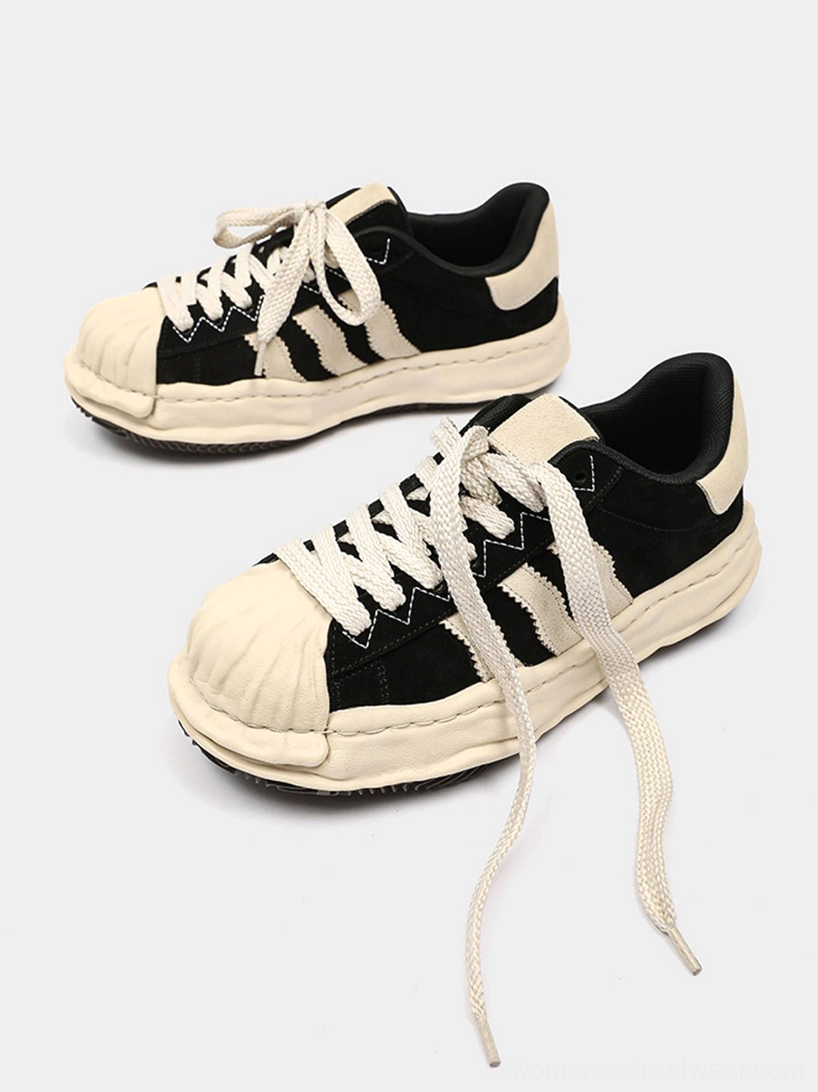 Black melted shell-toe platform sneakers product image showcasing the sculptural chunky sole, retro shell toe, and avant-garde Y2K streetwear silhouette