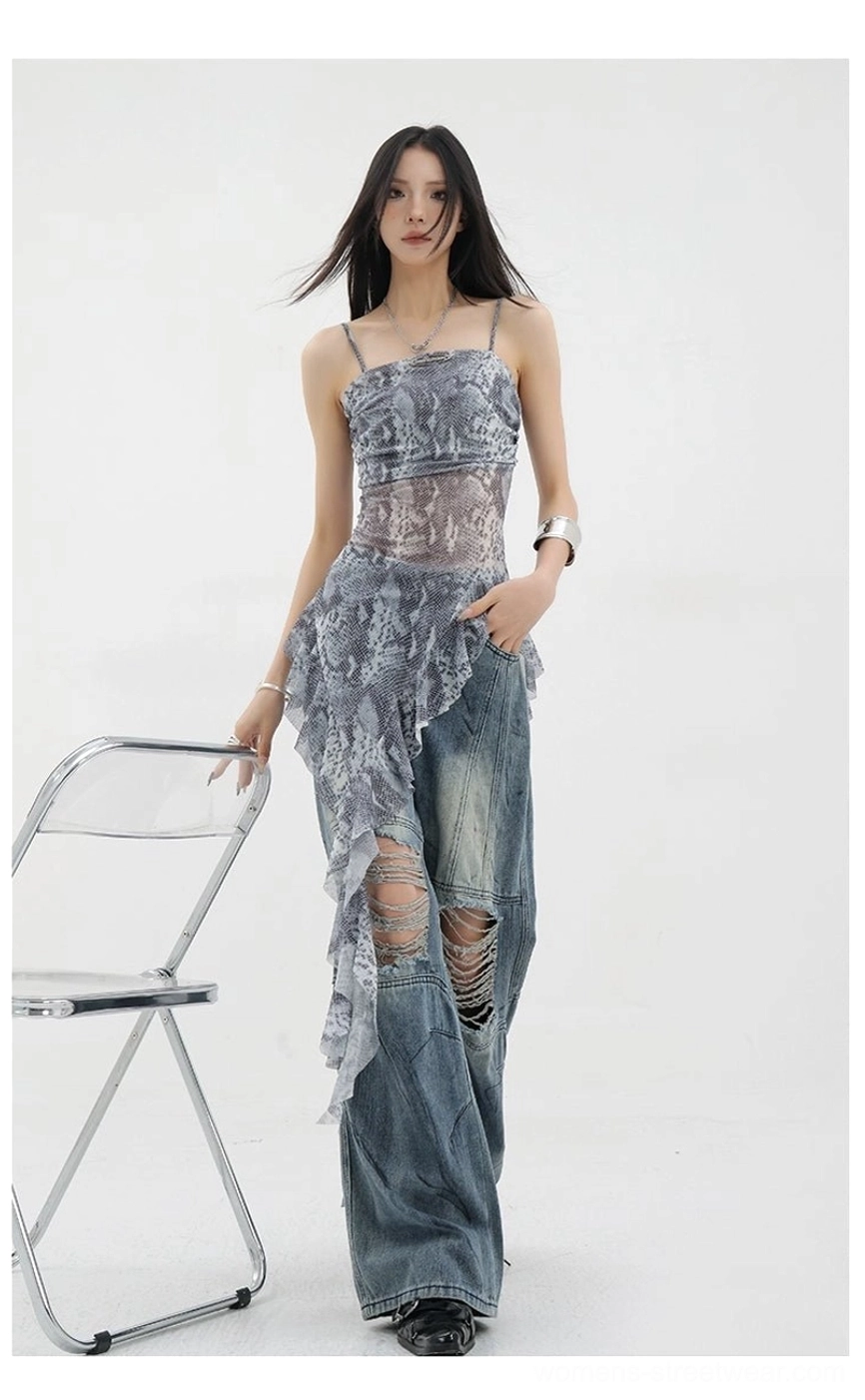 Black mesh asymmetric ribbon tank full body styling showing sophisticated layered aesthetic and editorial runway-ready approach
