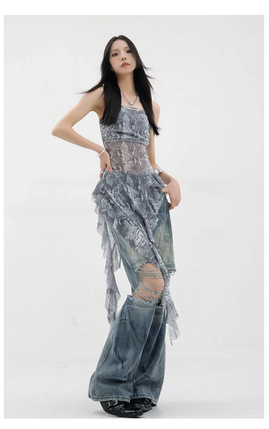 Black mesh asymmetric ruffle tank top showing transparency effect and advanced layering styling possibilities with contrasting pieces
