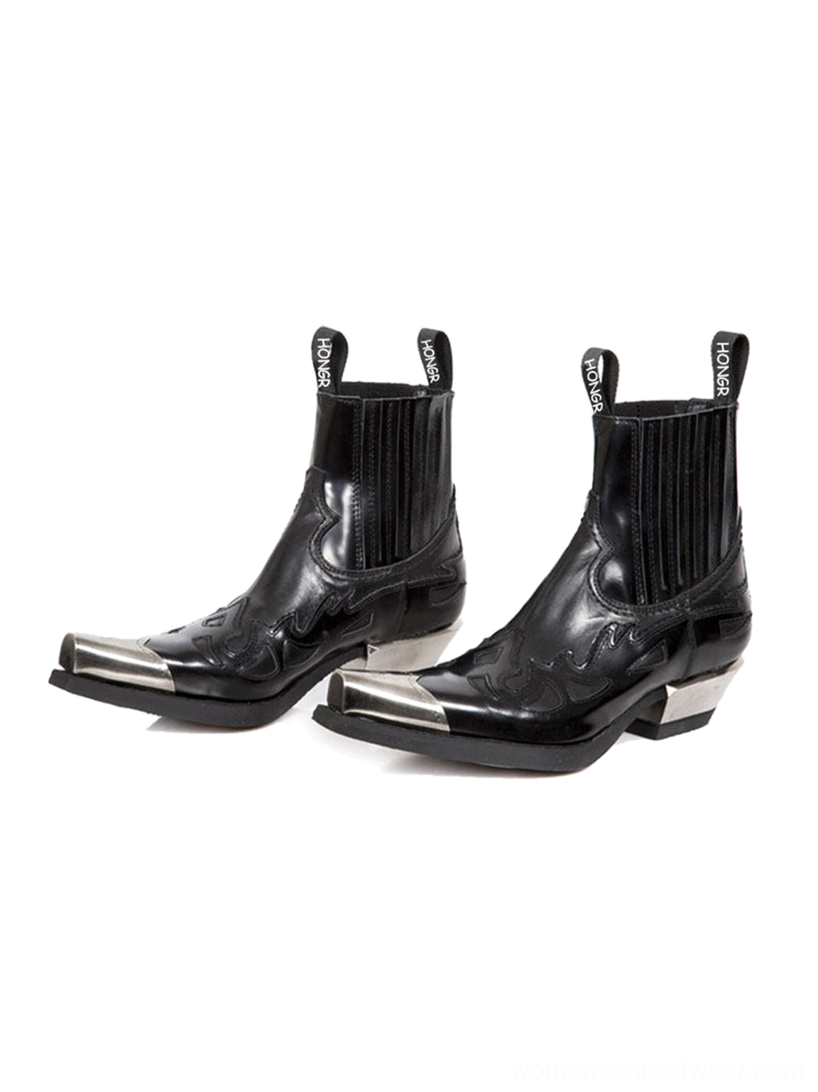 Three-quarter product view of black metallic toe Chelsea cowboy boots with western embossed upper, elastic side panels and silver block heels