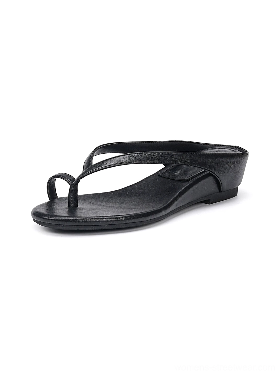 Front oblique view of black toe ring low wedge flip-flop sandal with smooth minimalist thong strap