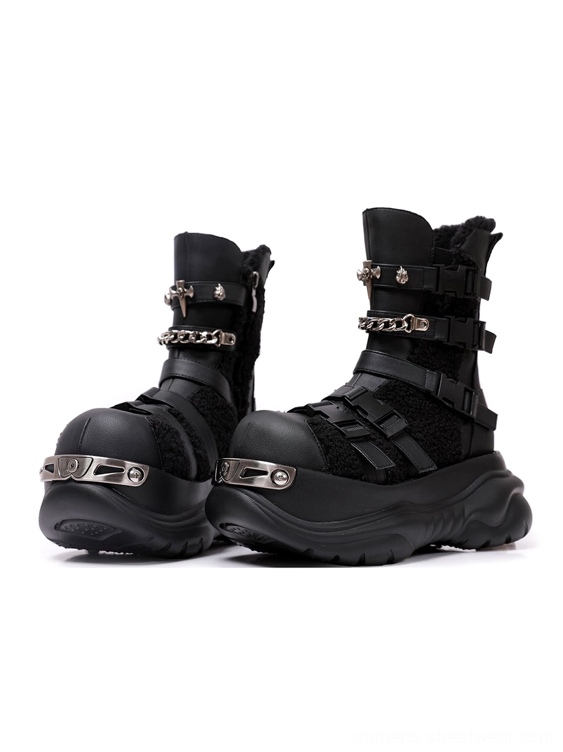 Three-quarter view of black multi-buckle motorcycle boots with adjustable straps, silver hardware, plush vamp panels, and thick platform soles