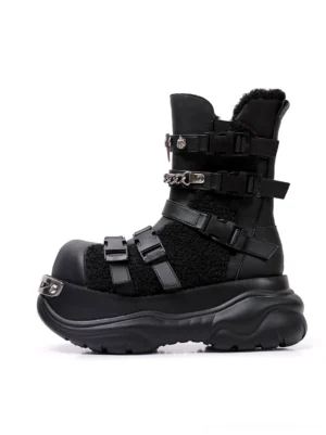 Black multi-buckle platform moto boots with chunky lug soles, metal toe caps, fleece vamp panels, and punk streetwear styling shown from the left side