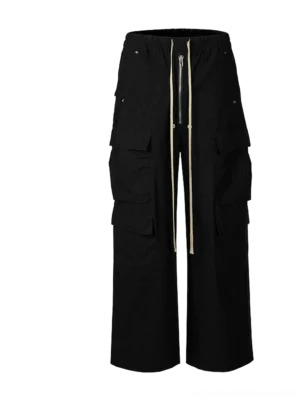 Black multi-pocket drawstring wide-leg streetwear cargo pants front flat lay showing oversized utility pockets and elastic waistband