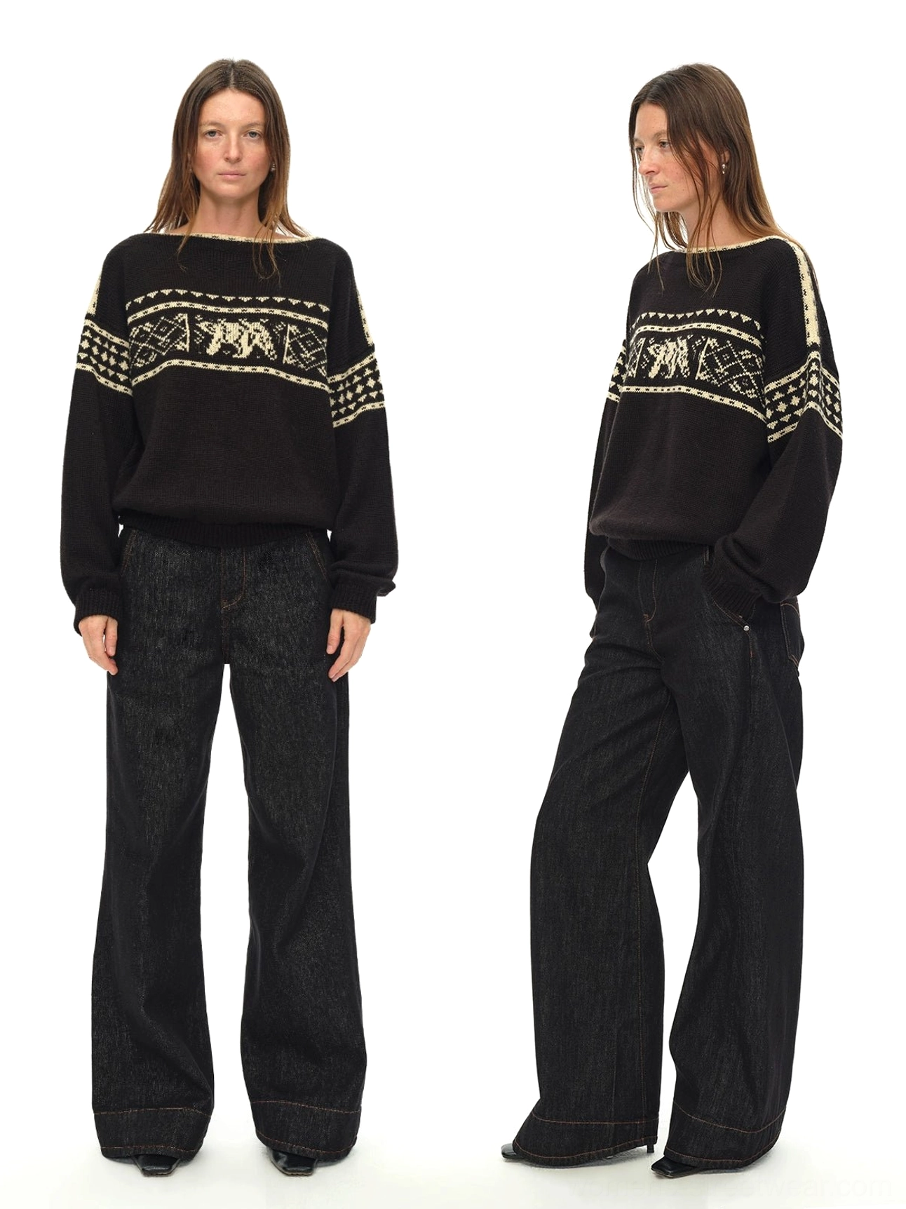 Front full-body view of black loose-fit Nordic folk jacquard sweater with cream polar bear pattern and wide boat neckline