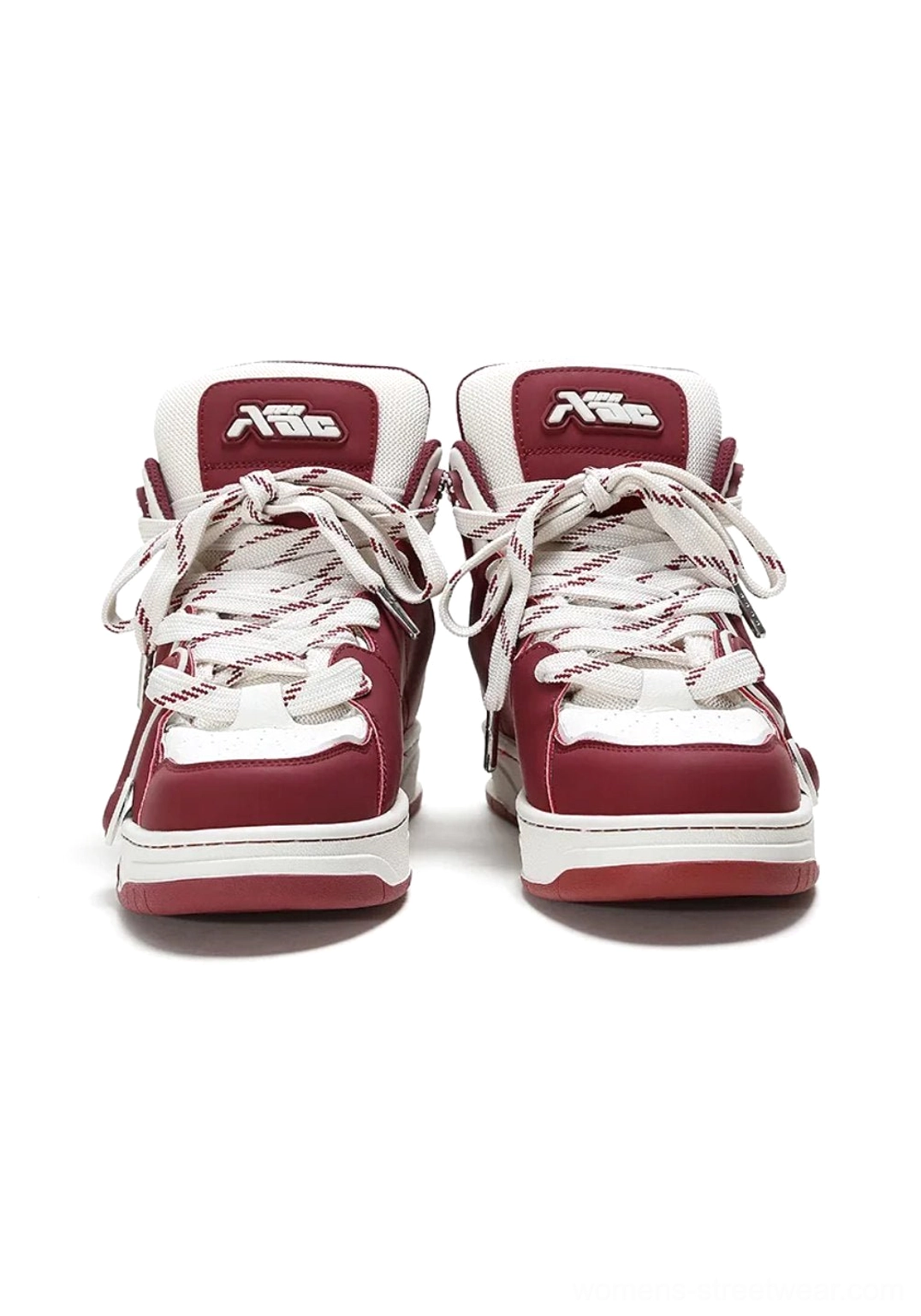 Front view of black and off-white high-top skate sneakers fully laced, showing the high-top shape and contrasting streetwear design