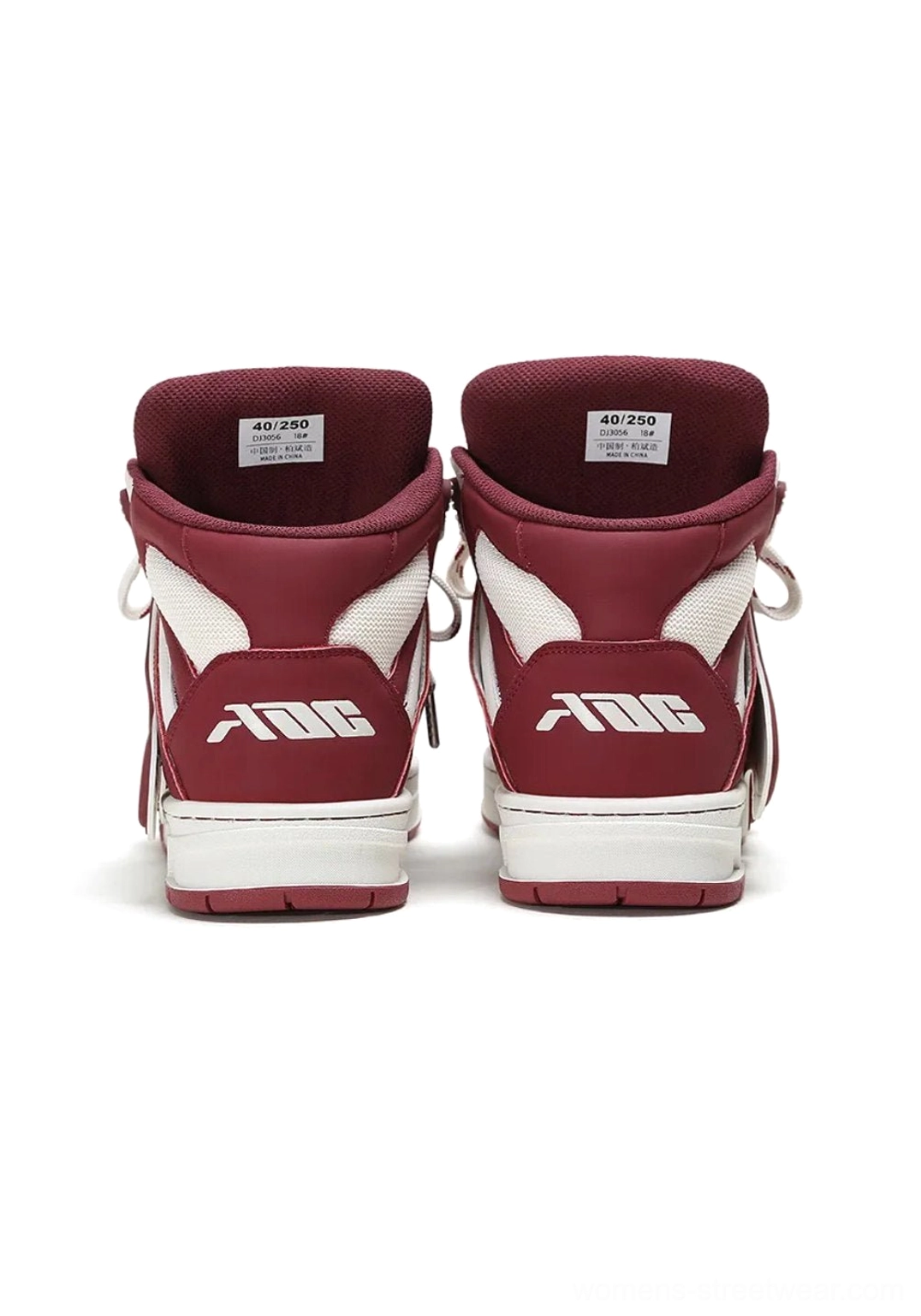 Rear view of a pair of black and off-white high-top skate sneakers showing the structured heel, high collar, and thick outsole