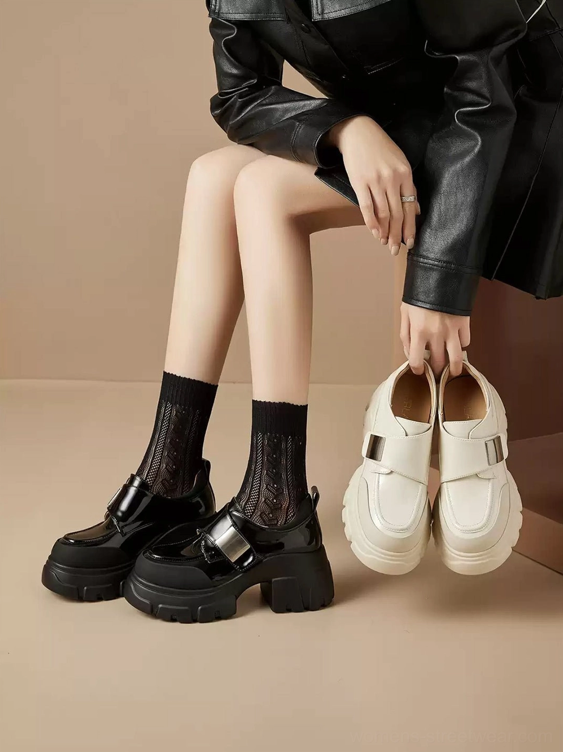 Black and off-white platform Mary Jane shoes with matching chunky sole and adjustable strap color options