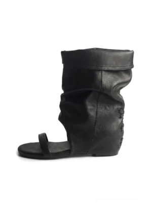 Black open-toe slouch ankle boot sandals shown from the left side on a white background, featuring a ruched fold-over shaft, single toe strap, artificial-leather upper, and back lace-up detail