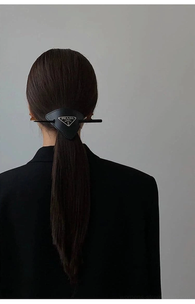 Black oversized blazer back view showing clean silhouette and loose fit from behind
