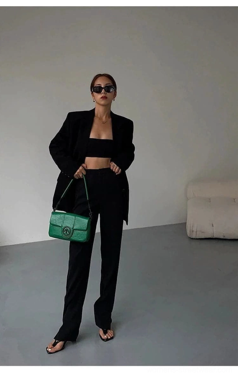 Black oversized blazer Korean minimalist design philosophy understated sophistication