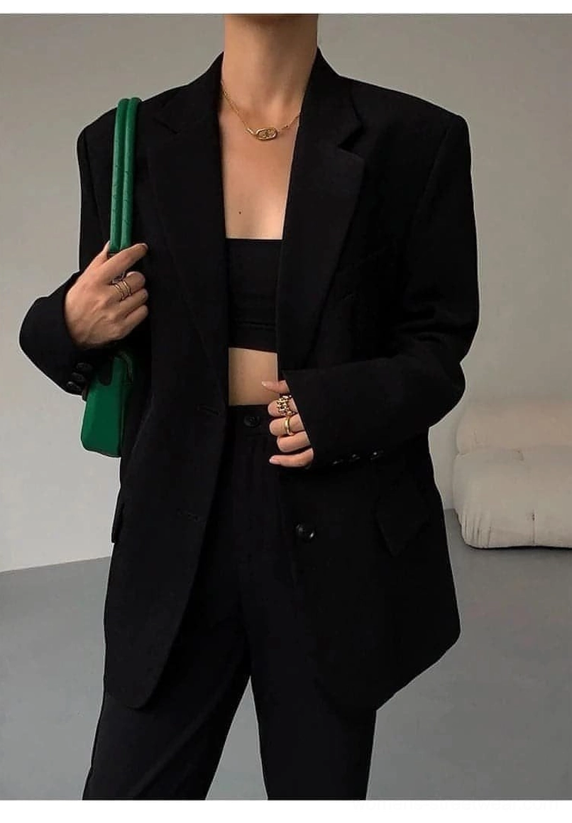 Black oversized blazer color depth matte black finish photography studio lighting detail